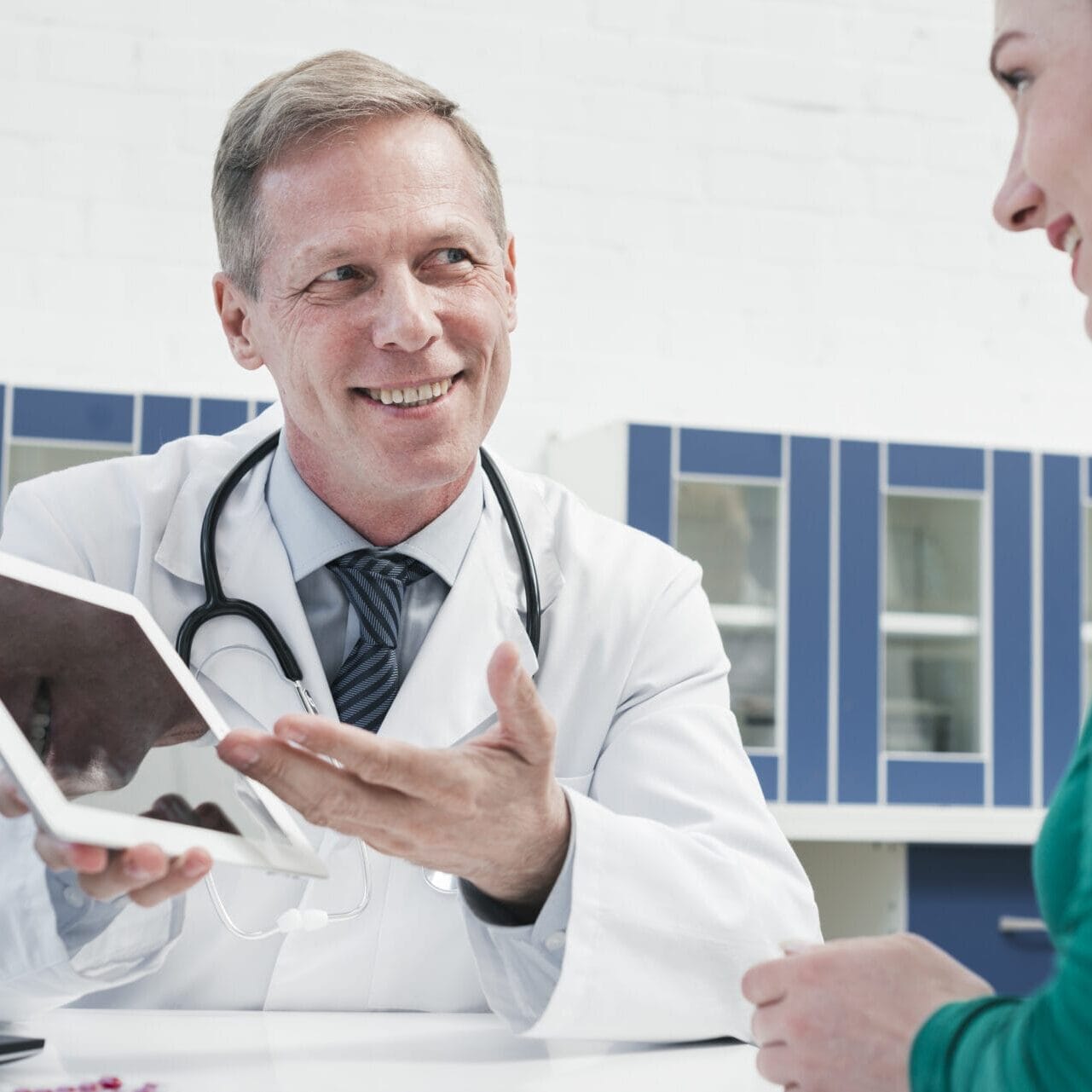 doctor-tending-patient doctor-tending-patient